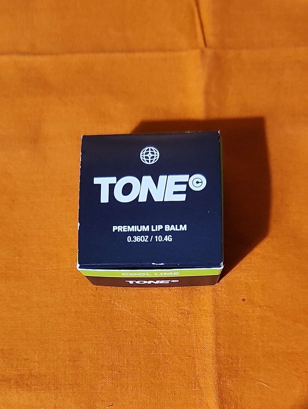 Tone cool lime lip balm